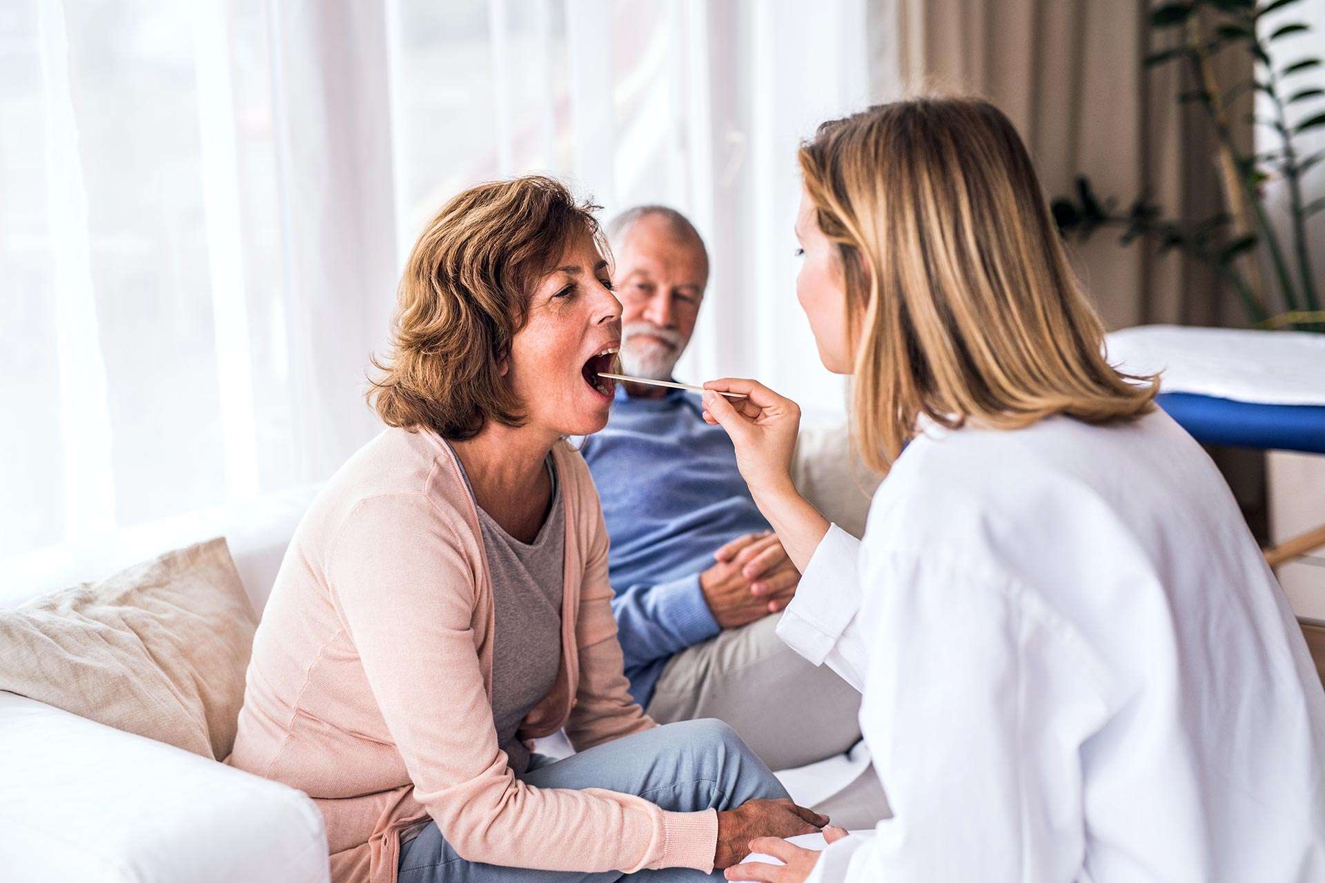 female doctor examining a senior woman 2021 08 26 12 07 48 utc Residence