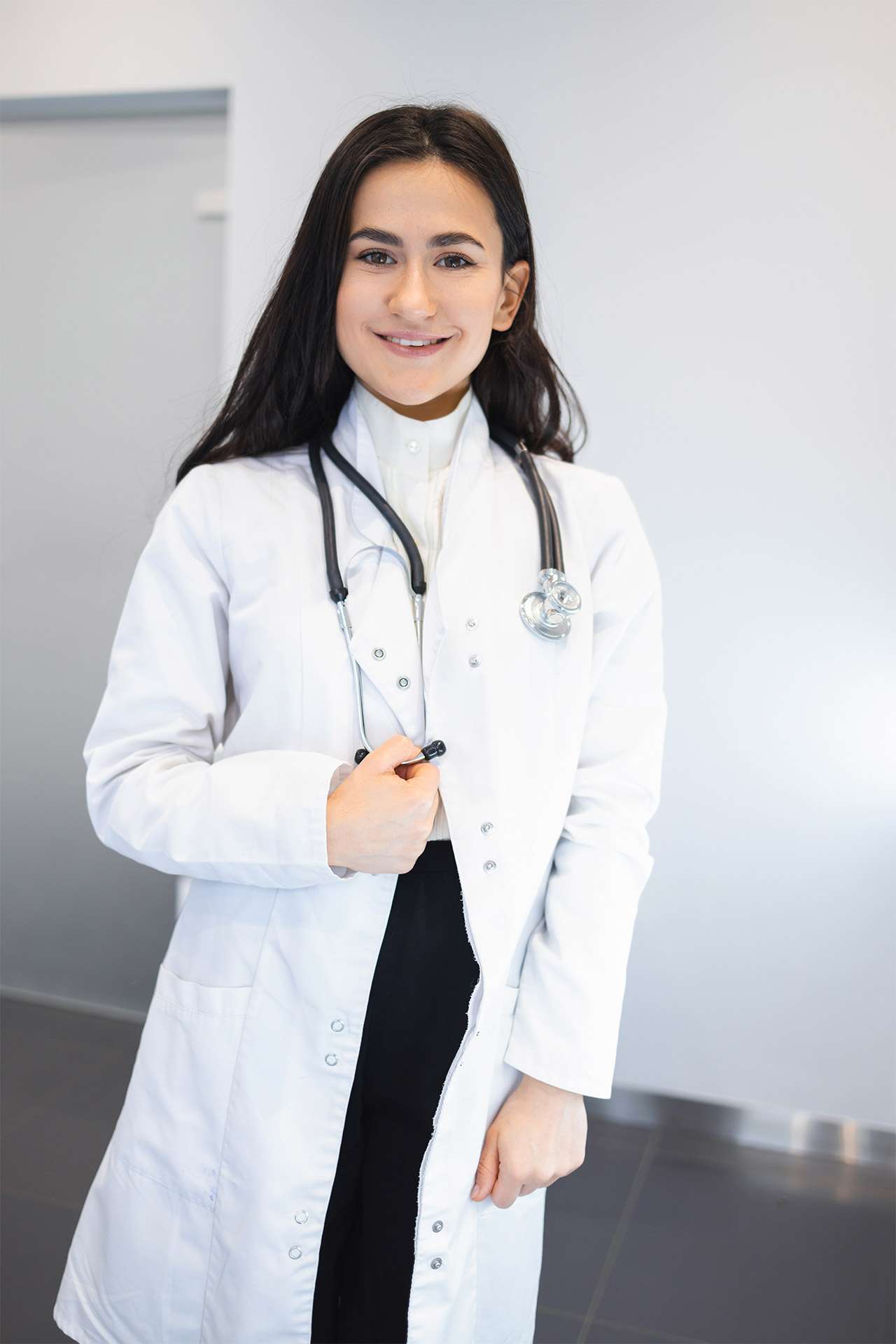 portrait of attractive young female doctor in whit 2022 02 17 20 02 21 utc Residence